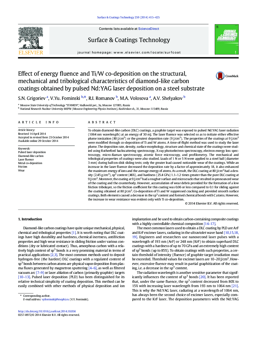 Effect of energy fluence and Ti/W co-deposition on the structural, mechanical and tribological characteristics of diamond-like carbon coatings obtained by pulsed Nd:YAG laser deposition on a steel substrate