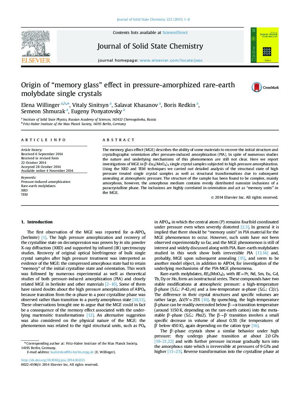 Origin of “memory glass” effect in pressure-amorphized rare-earth molybdate single crystals