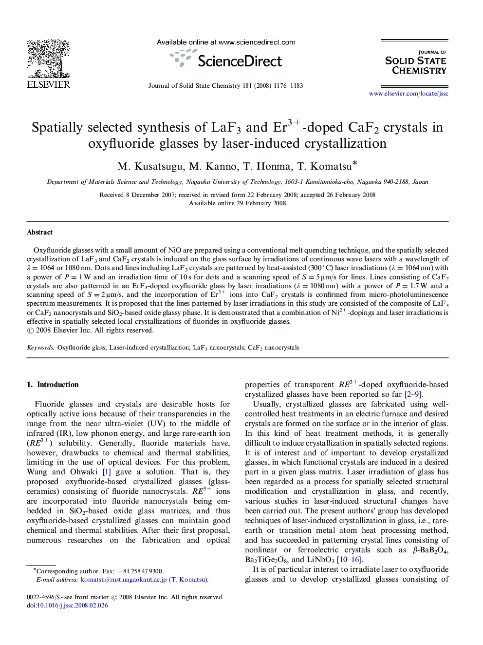 Spatially selected synthesis of LaF3 and Er3+-doped CaF2 crystals in oxyfluoride glasses by laser-induced crystallization
