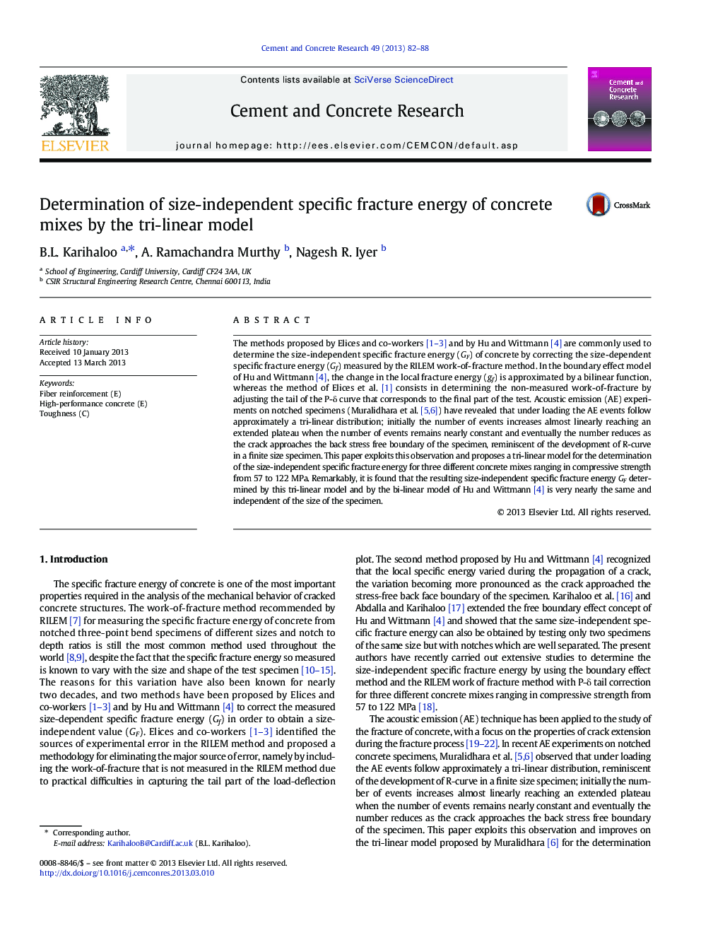 Determination of size-independent specific fracture energy of concrete mixes by the tri-linear model