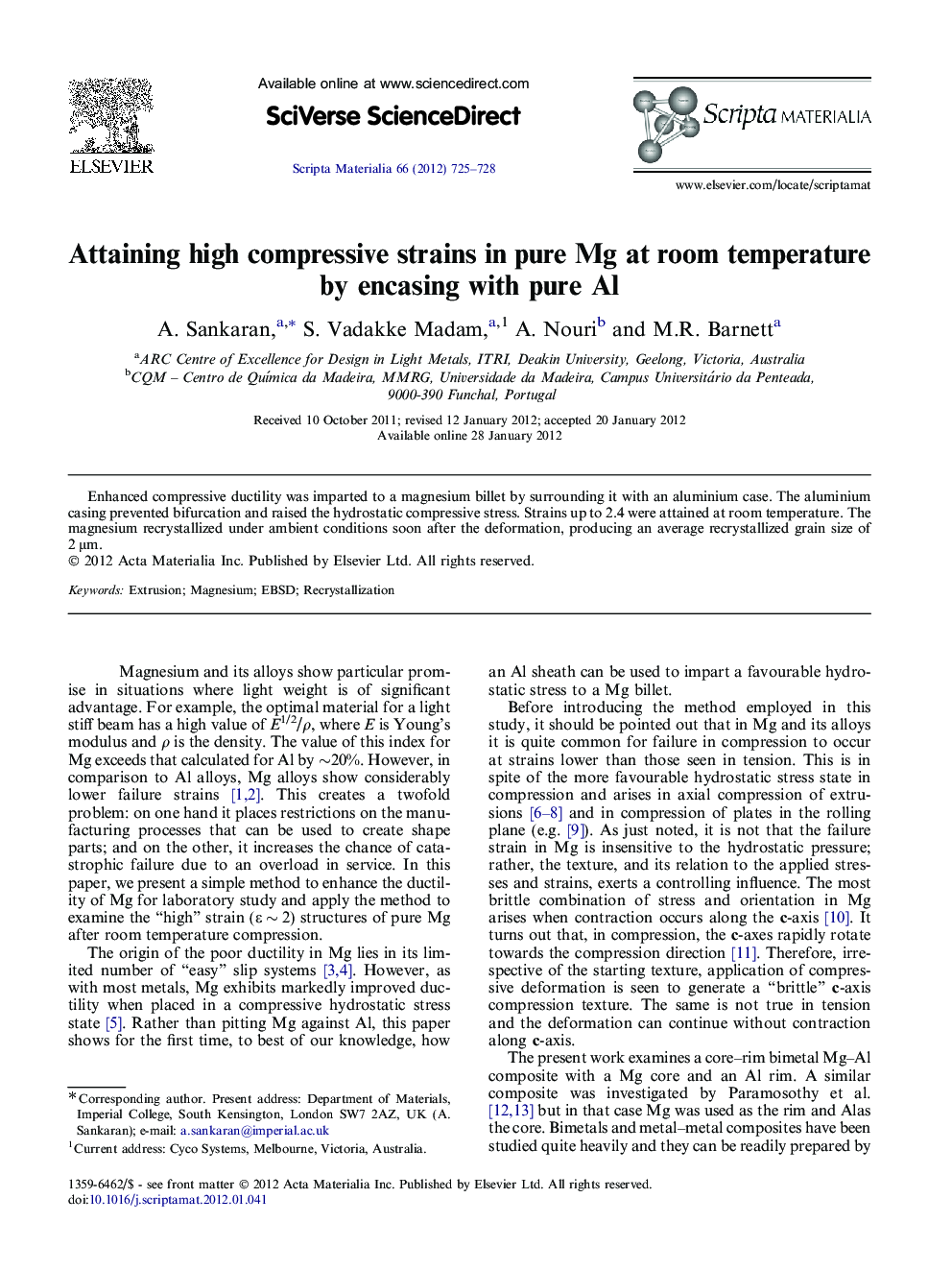 Attaining high compressive strains in pure Mg at room temperature by encasing with pure Al