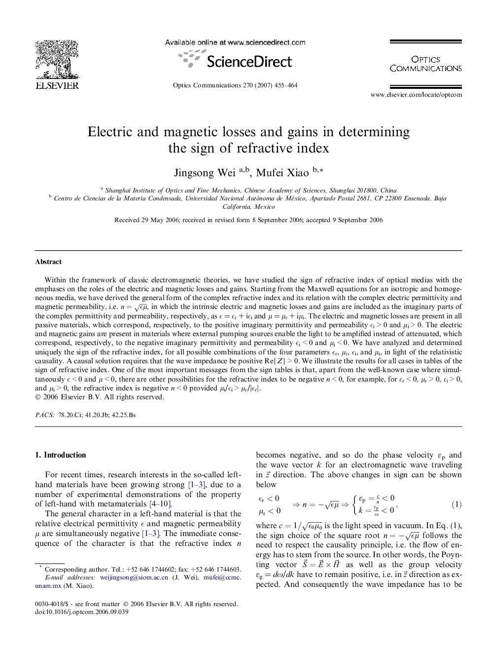 Electric and magnetic losses and gains in determining the sign of refractive index