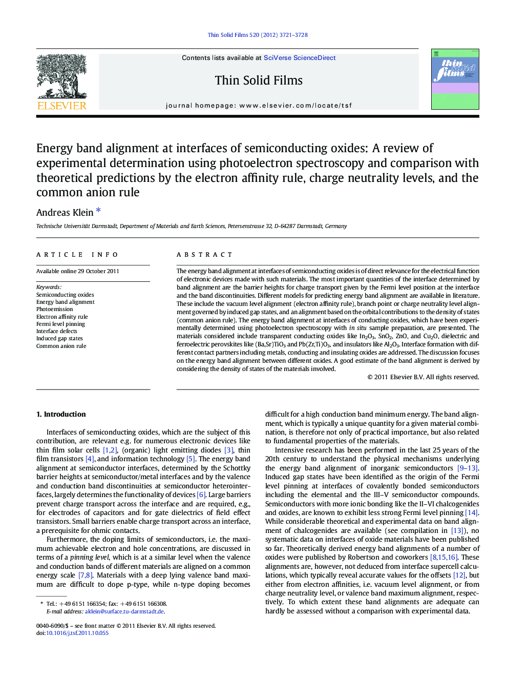 Energy band alignment at interfaces of semiconducting oxides: A review of experimental determination using photoelectron spectroscopy and comparison with theoretical predictions by the electron affinity rule, charge neutrality levels, and the common anion