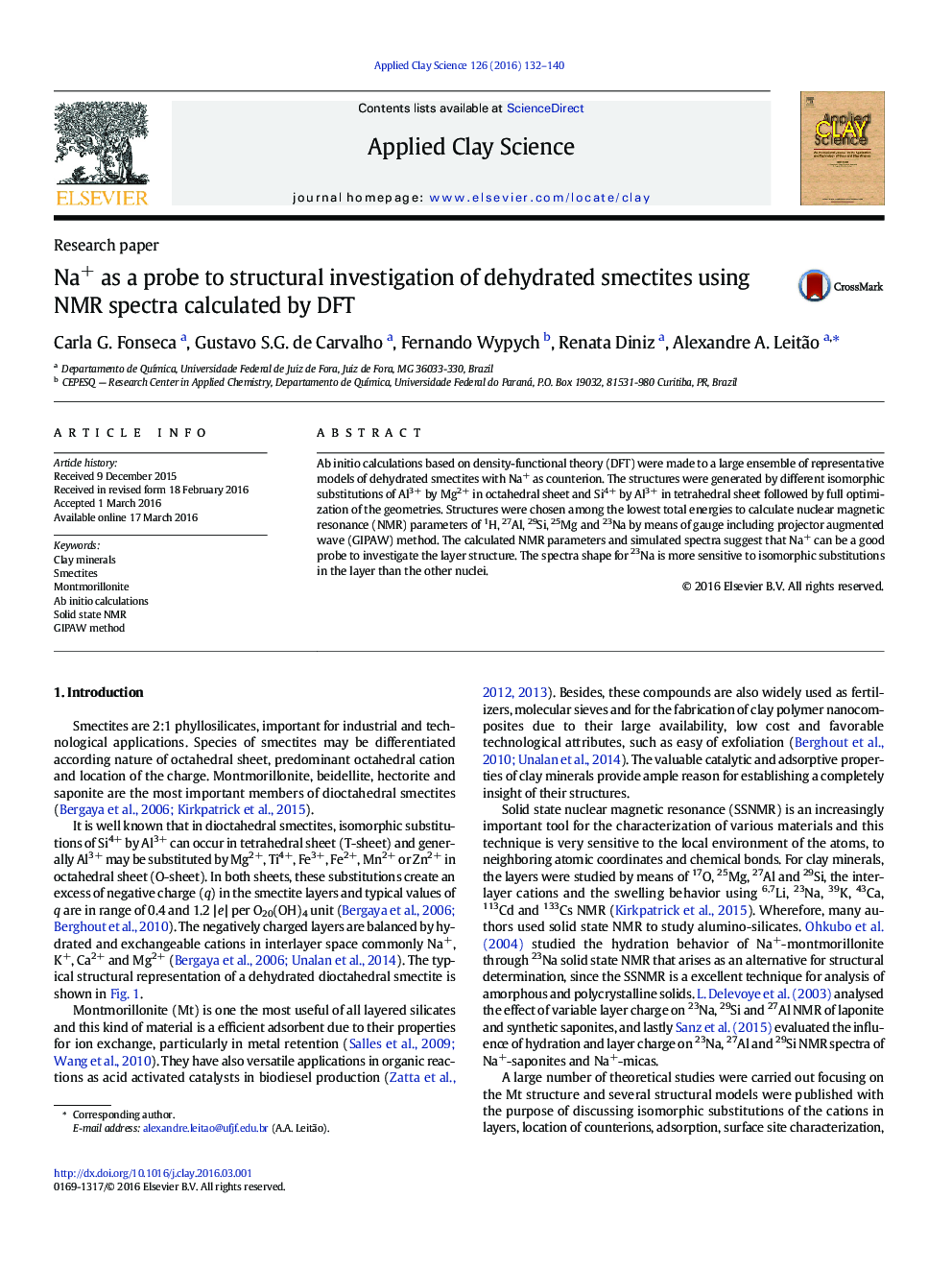 Na+ as a probe to structural investigation of dehydrated smectites using NMR spectra calculated by DFT