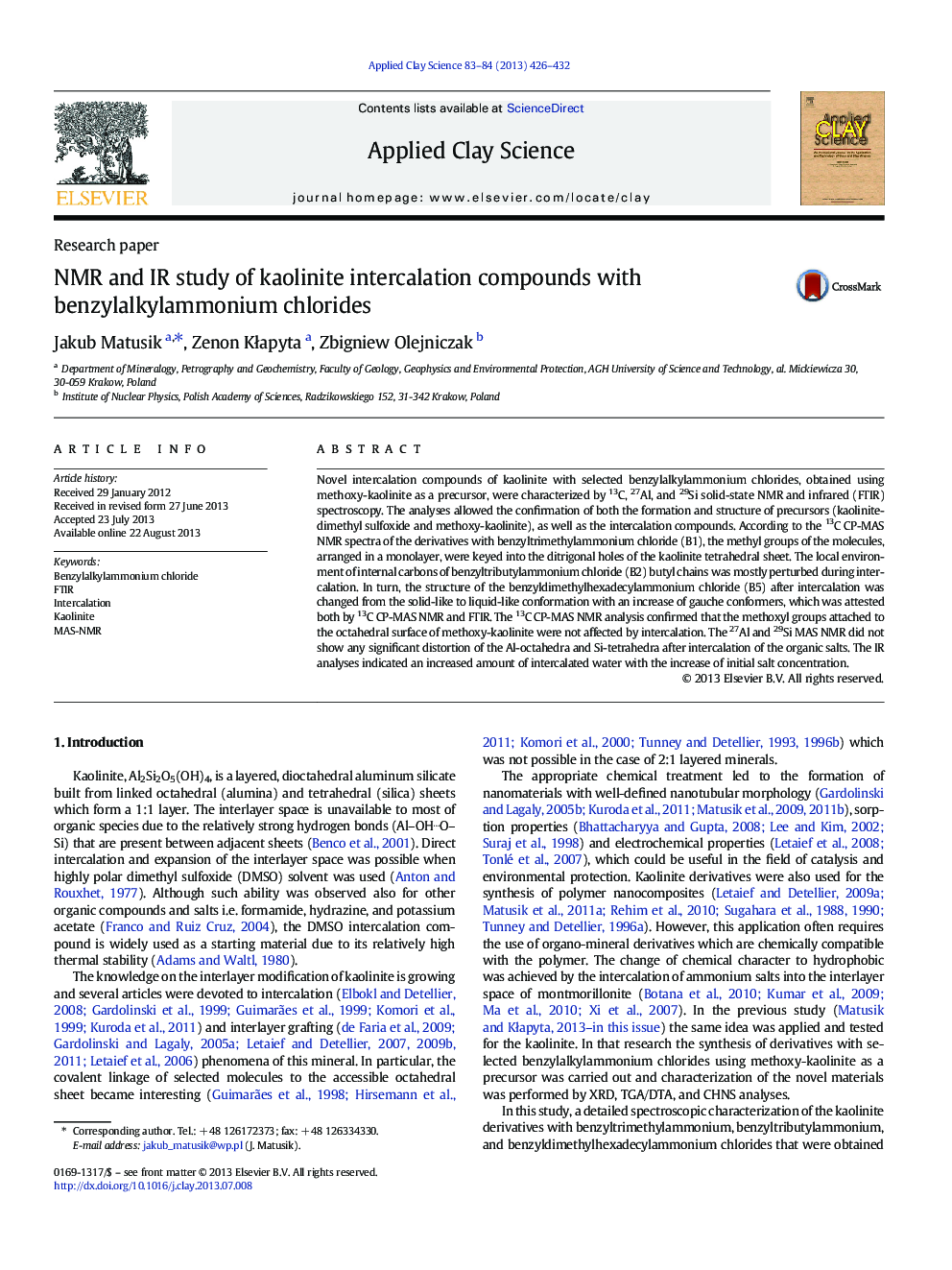 NMR and IR study of kaolinite intercalation compounds with benzylalkylammonium chlorides
