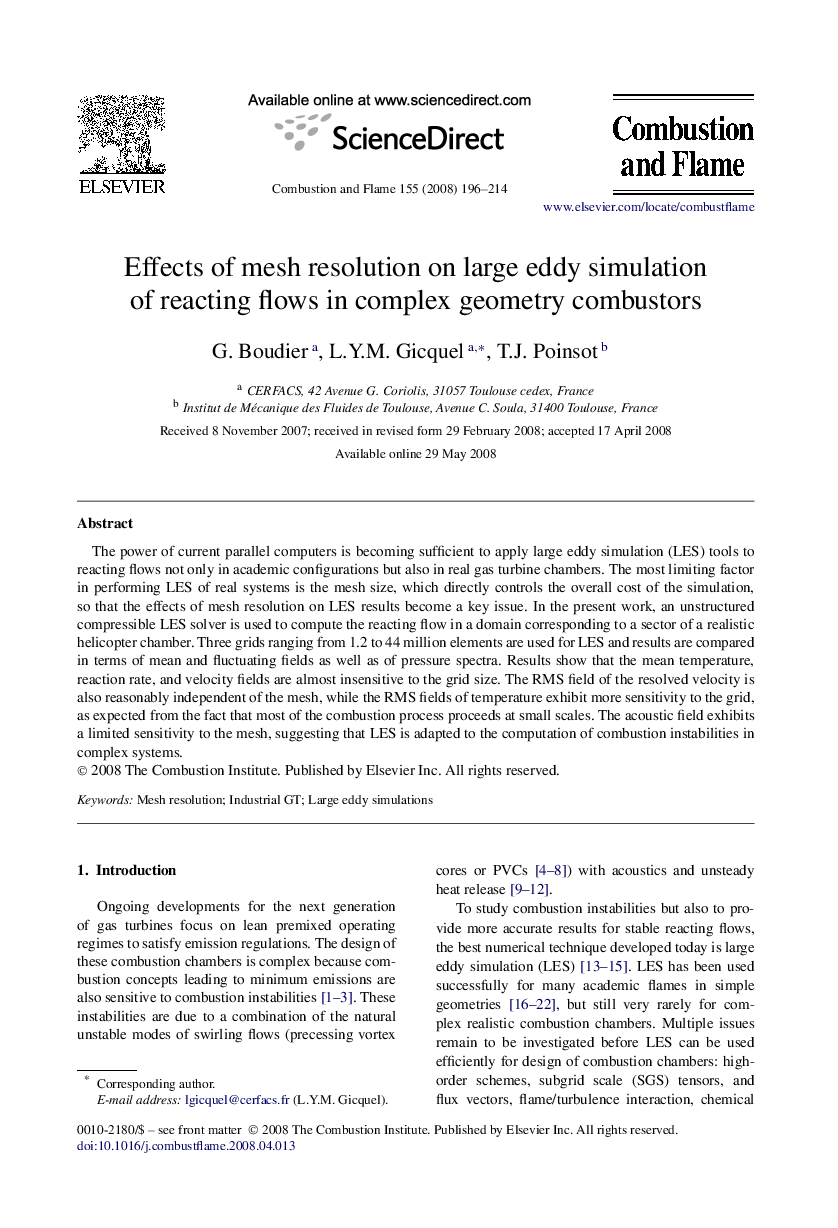 Effects of mesh resolution on large eddy simulation of reacting flows in complex geometry combustors