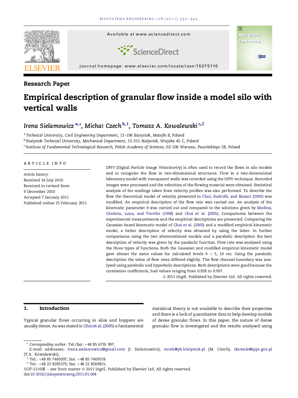Empirical description of granular flow inside a model silo with vertical walls