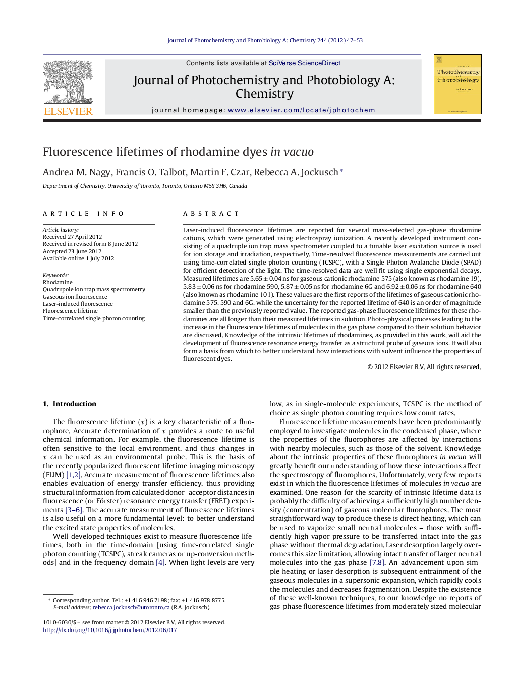 Fluorescence lifetimes of rhodamine dyes in vacuo