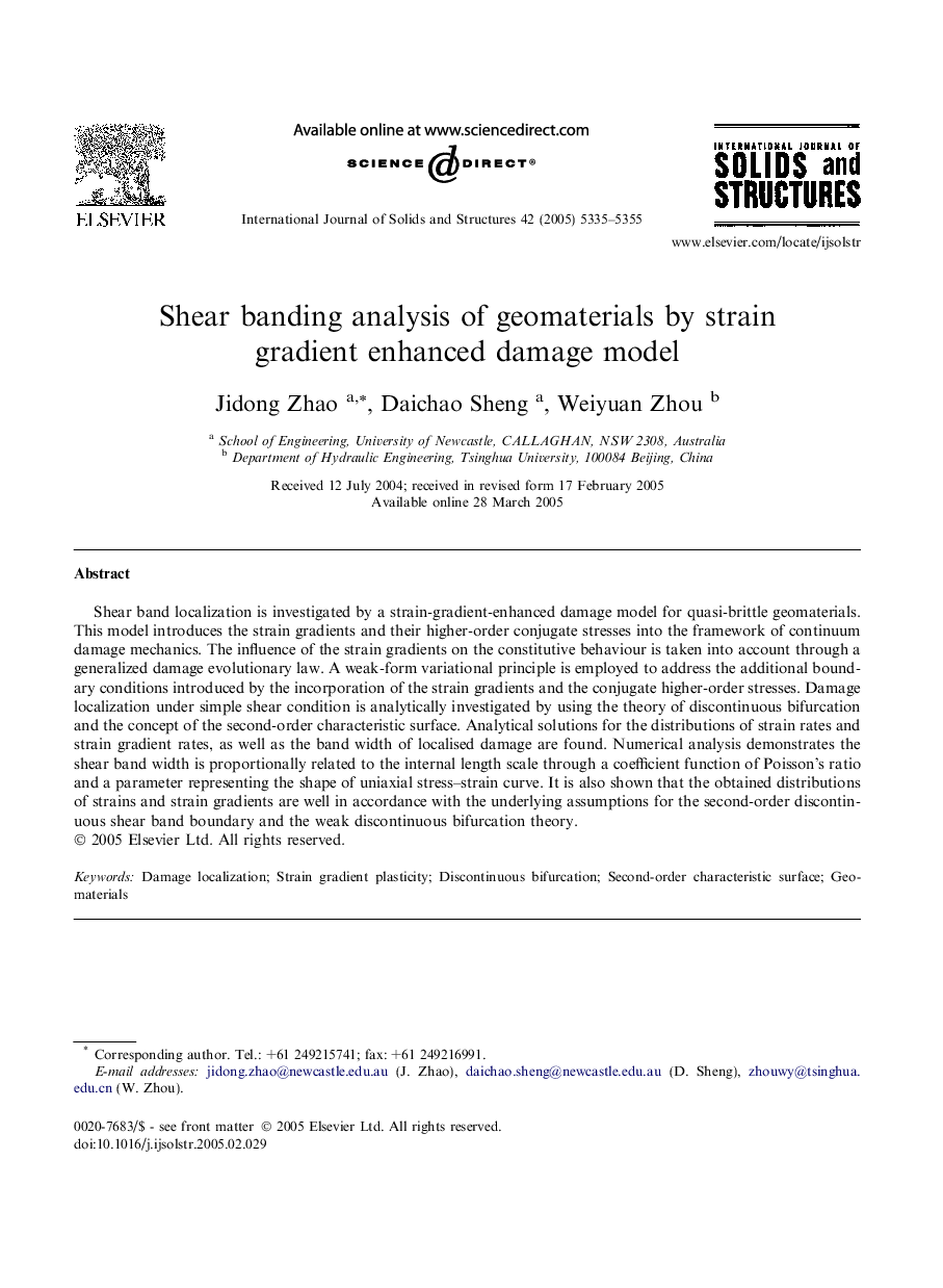 Shear banding analysis of geomaterials by strain gradient enhanced damage model