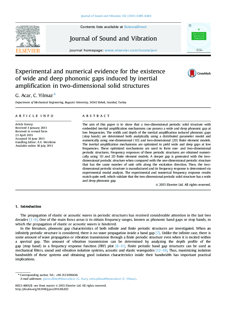 Experimental and numerical evidence for the existence of wide and deep phononic gaps induced by inertial amplification in two-dimensional solid structures