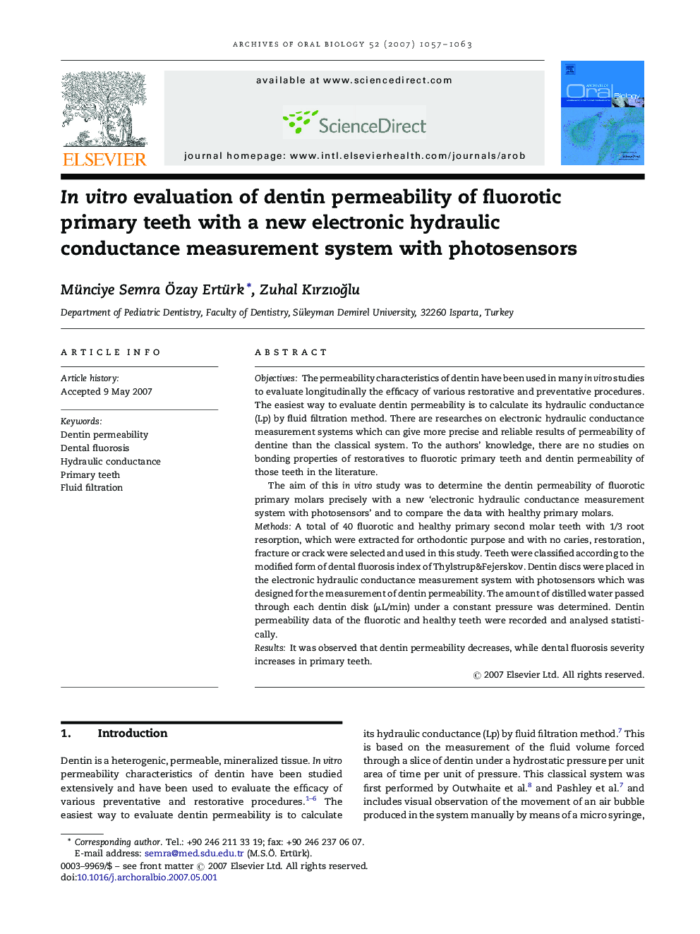 In vitro evaluation of dentin permeability of fluorotic primary teeth with a new electronic hydraulic conductance measurement system with photosensors