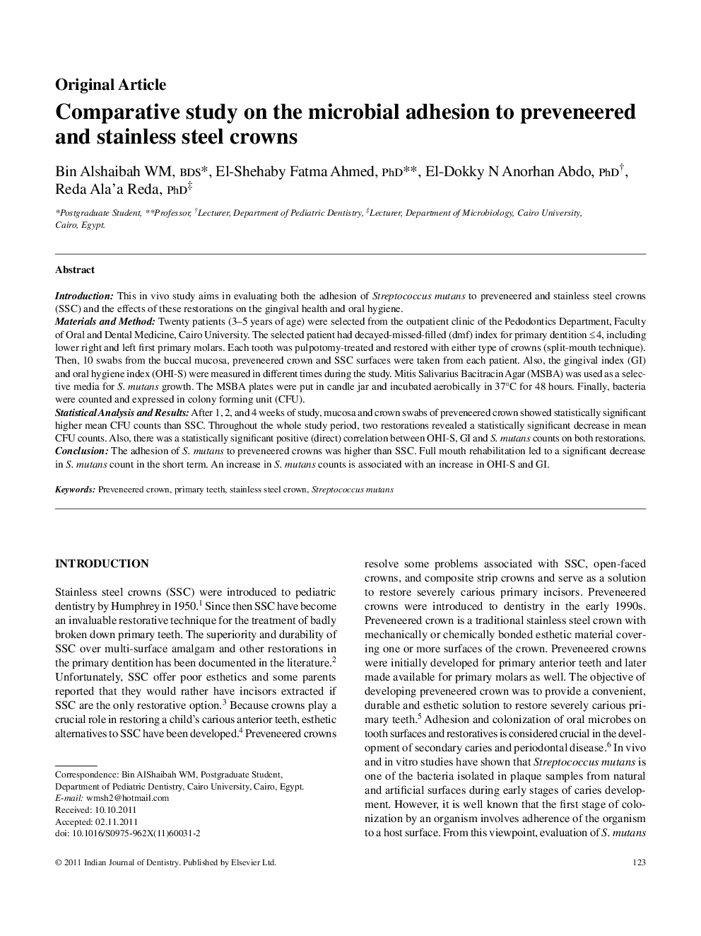 Comparative study on the microbial adhesion to preveneered and stainless steel crowns