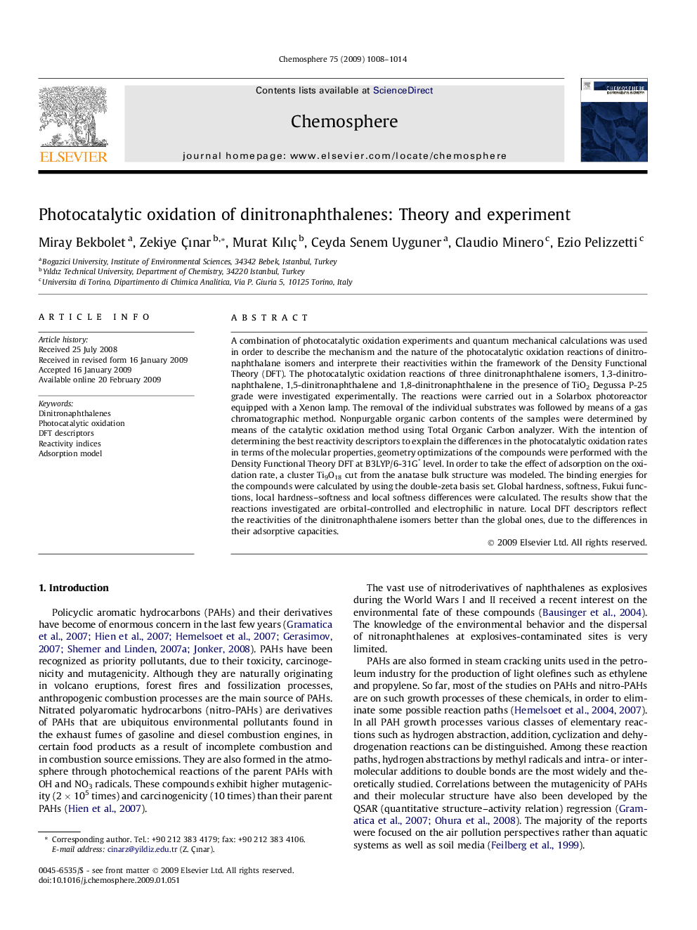 Photocatalytic oxidation of dinitronaphthalenes: Theory and experiment
