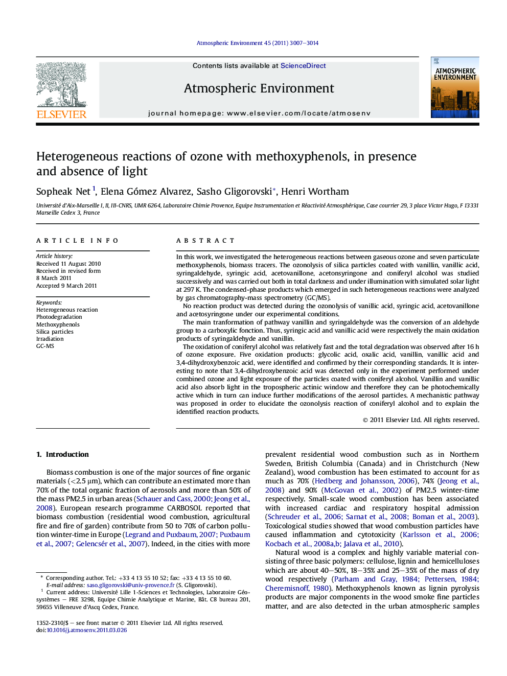 Heterogeneous reactions of ozone with methoxyphenols, in presence and absence of light