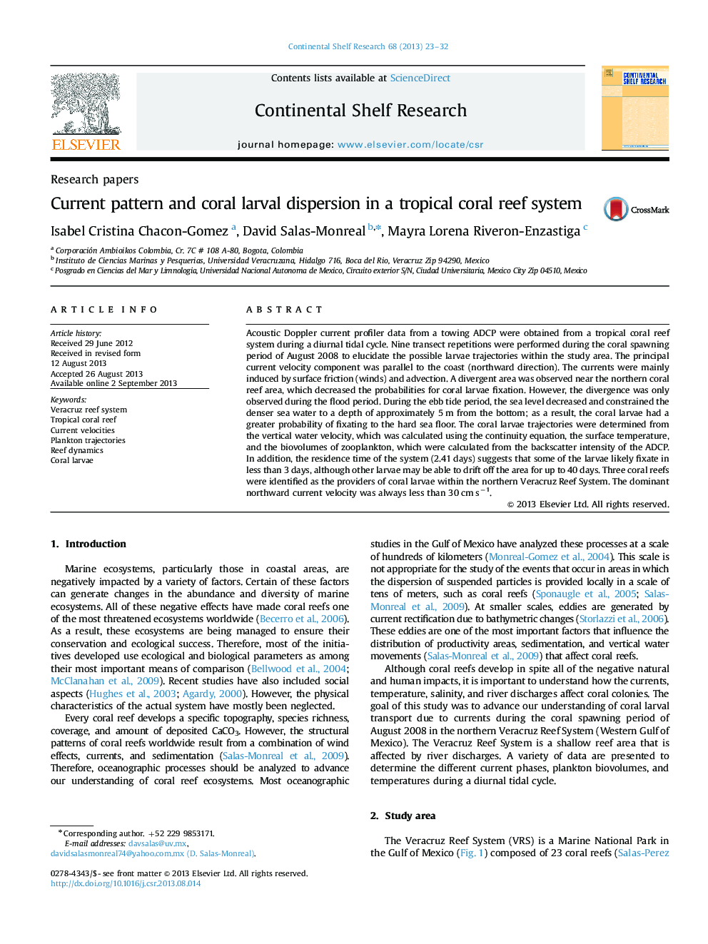 Current pattern and coral larval dispersion in a tropical coral reef system