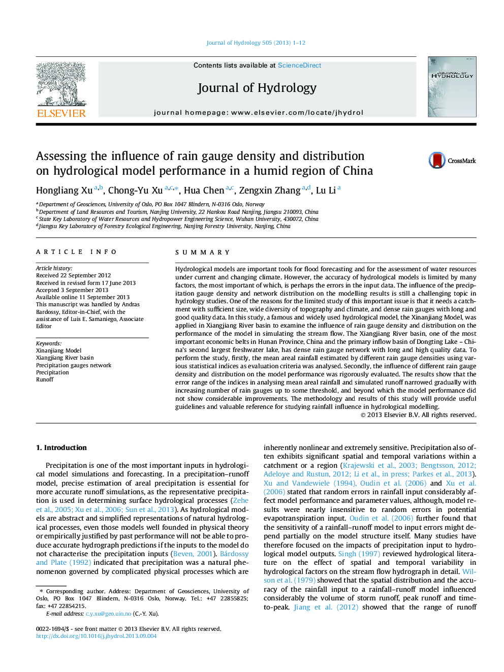 Assessing the influence of rain gauge density and distribution on hydrological model performance in a humid region of China