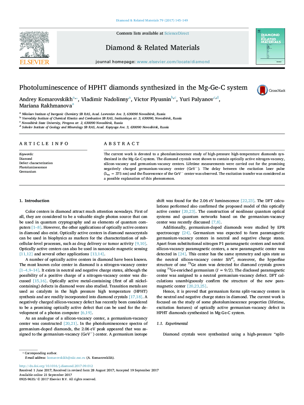 Photoluminescence of HPHT diamonds synthesized in the Mg-Ge-C system