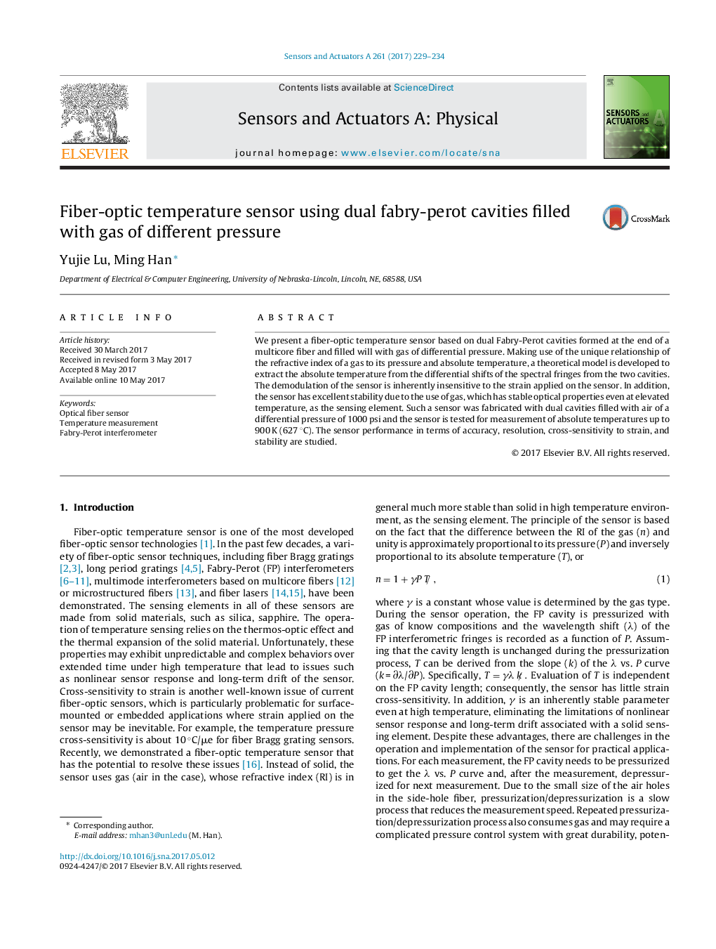 Fiber-optic temperature sensor using dual fabry-perot cavities filled with gas of different pressure