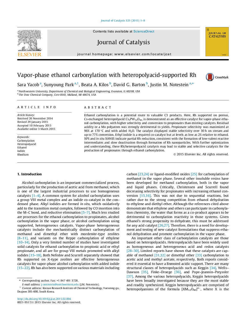 Vapor-phase ethanol carbonylation with heteropolyacid-supported Rh