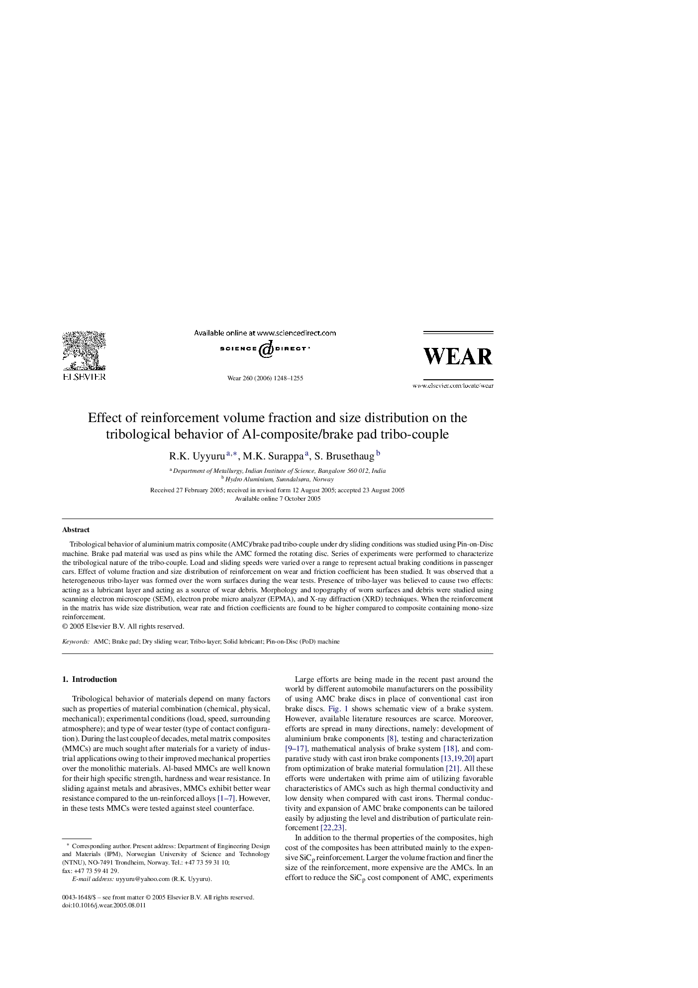 Effect of reinforcement volume fraction and size distribution on the tribological behavior of Al-composite/brake pad tribo-couple