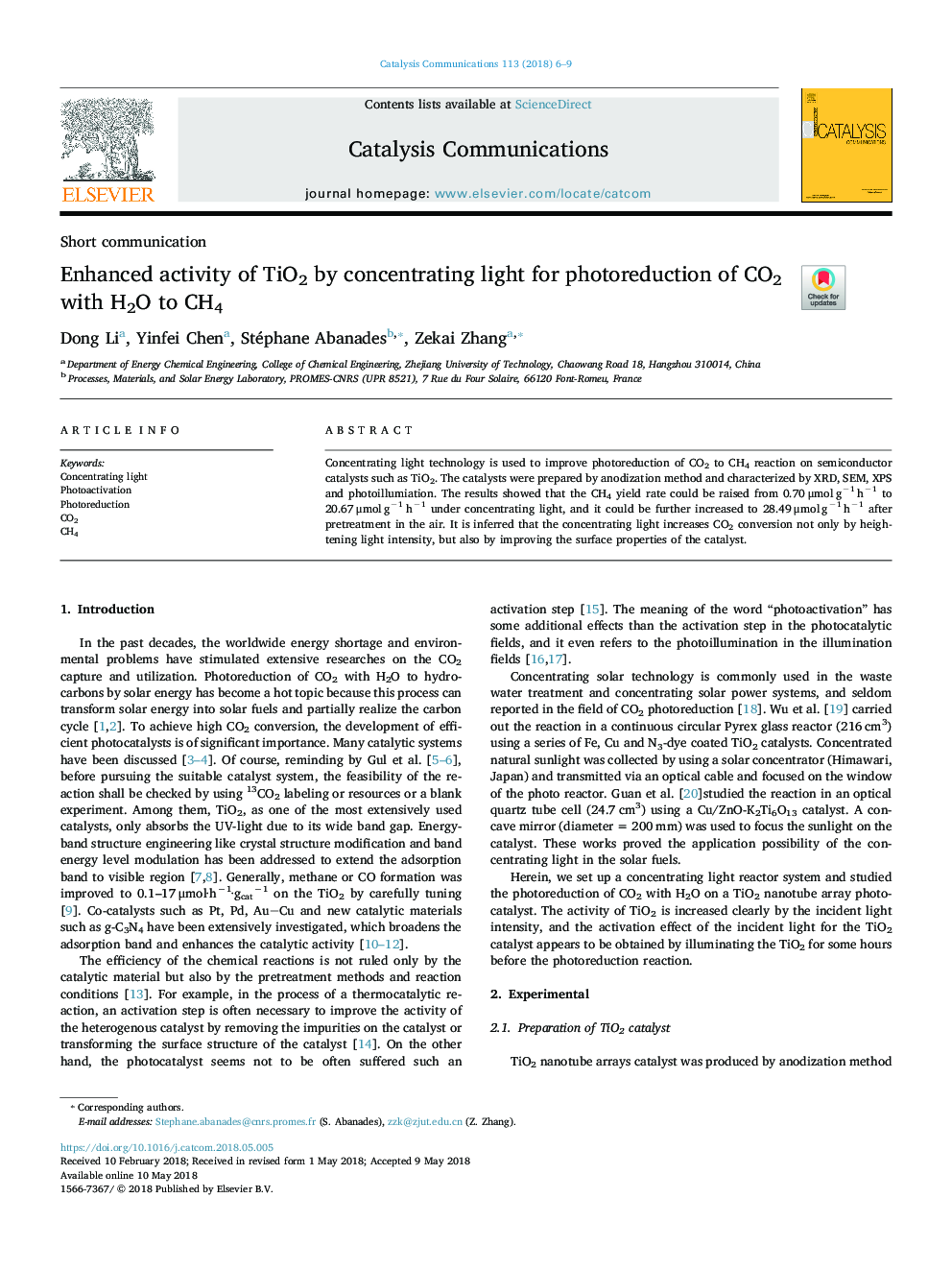 Enhanced activity of TiO2 by concentrating light for photoreduction of CO2 with H2O to CH4