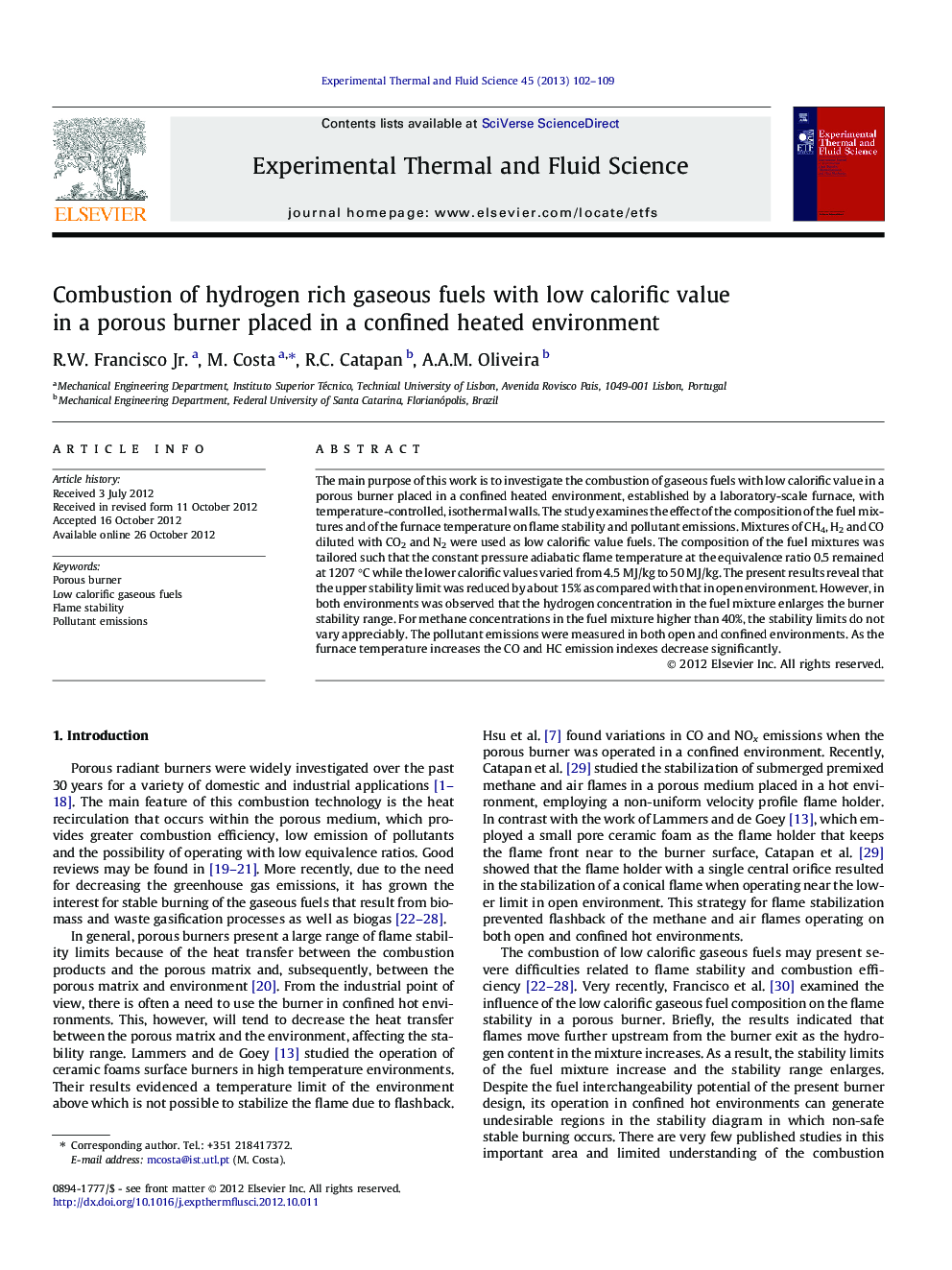 Combustion of hydrogen rich gaseous fuels with low calorific value in a porous burner placed in a confined heated environment