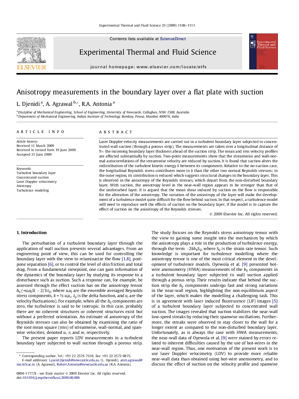 Anisotropy measurements in the boundary layer over a flat plate with suction