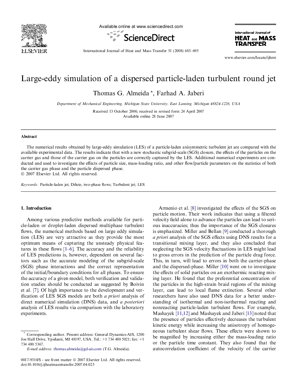 Large-eddy simulation of a dispersed particle-laden turbulent round jet