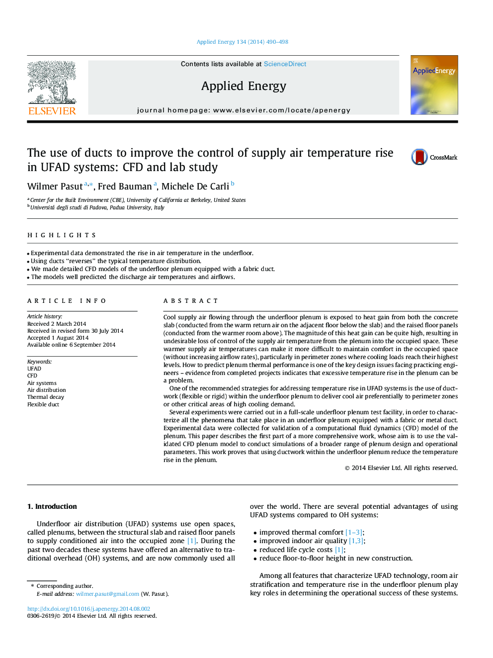 The use of ducts to improve the control of supply air temperature rise in UFAD systems: CFD and lab study