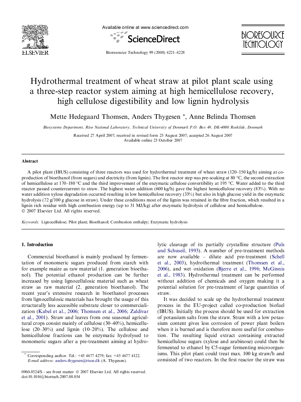 Hydrothermal treatment of wheat straw at pilot plant scale using a three-step reactor system aiming at high hemicellulose recovery, high cellulose digestibility and low lignin hydrolysis