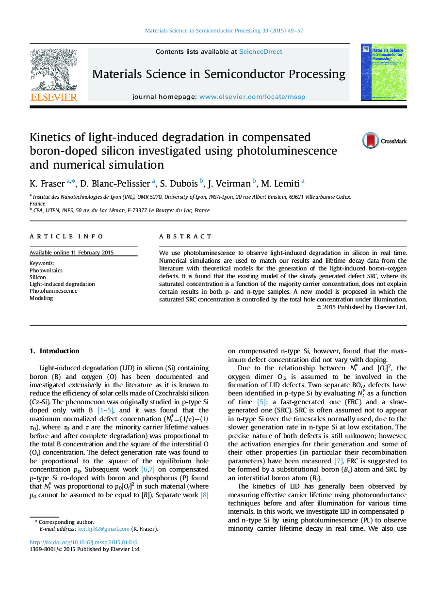 Kinetics of light-induced degradation in compensated boron-doped silicon investigated using photoluminescence and numerical simulation