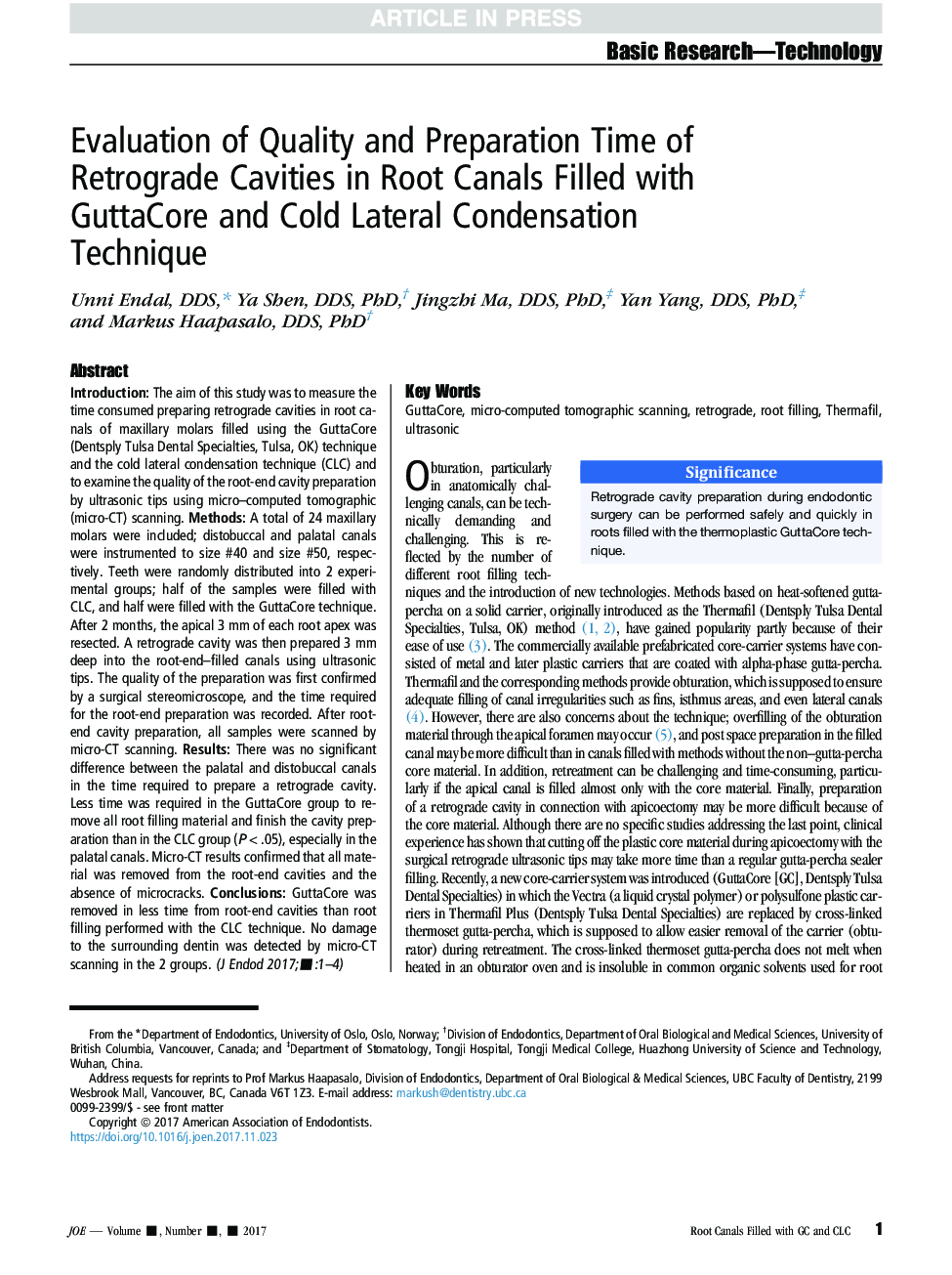 Evaluation of Quality and Preparation Time of Retrograde Cavities in Root Canals Filled with GuttaCore and Cold Lateral Condensation Technique