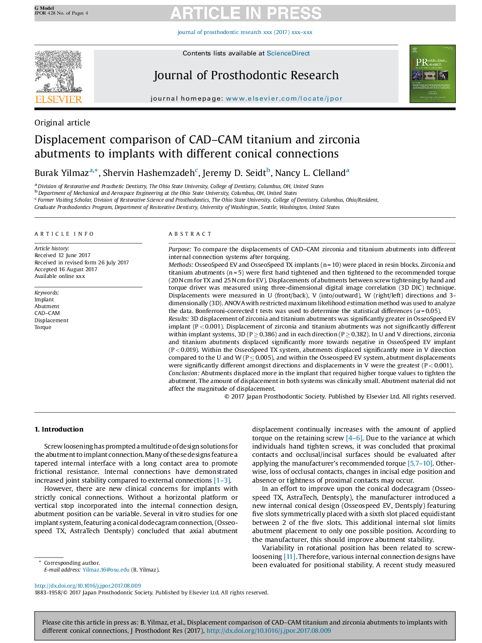 Displacement comparison of CAD-CAM titanium and zirconia abutments to implants with different conical connections