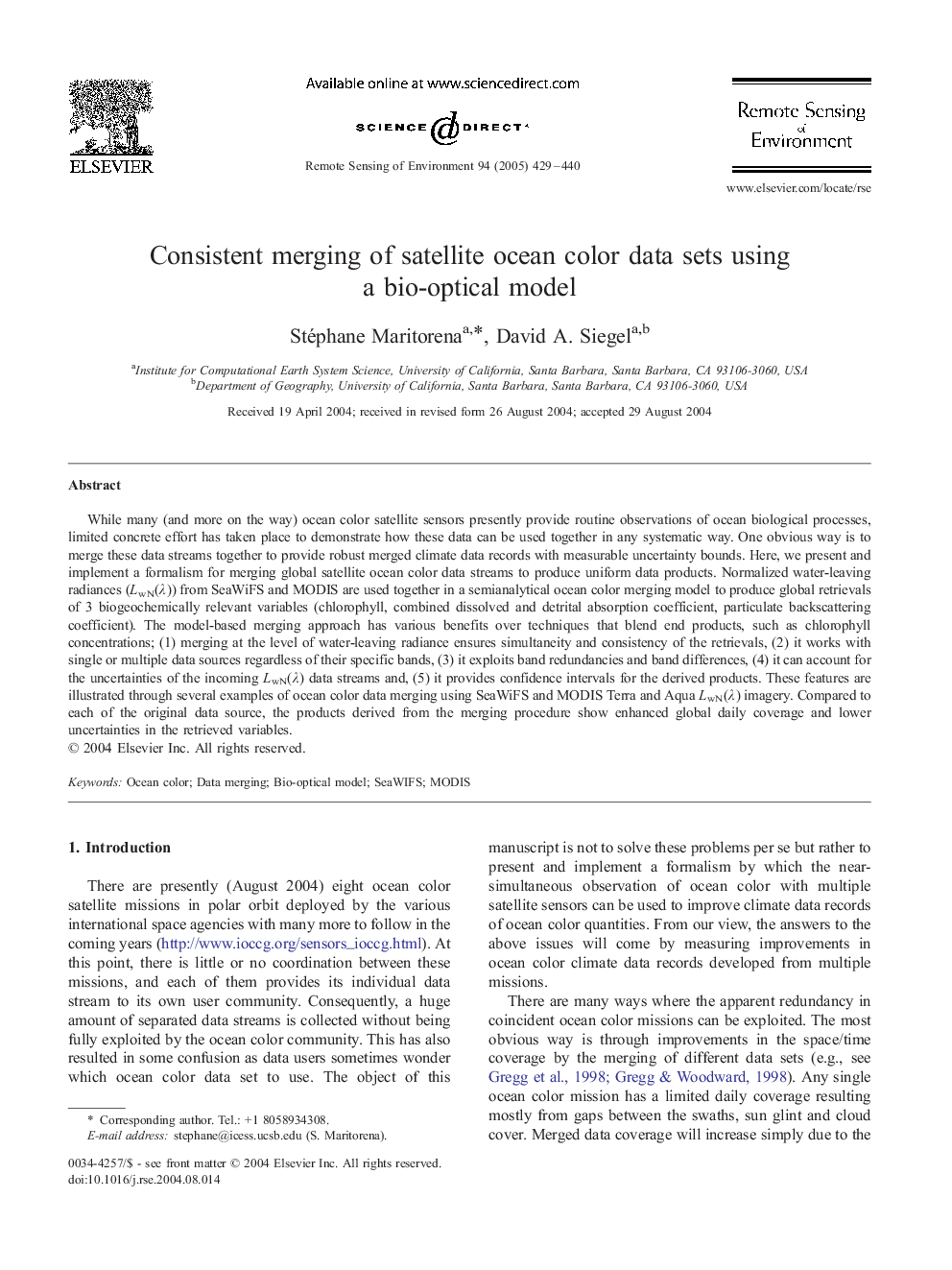 Consistent merging of satellite ocean color data sets using a bio-optical model