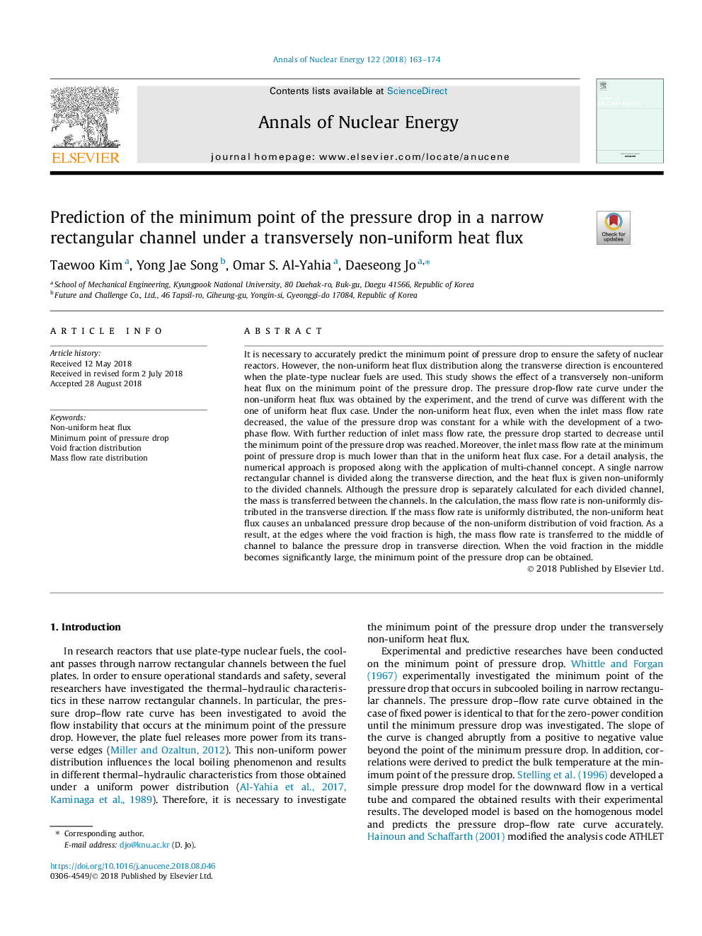 Prediction of the minimum point of the pressure drop in a narrow rectangular channel under a transversely non-uniform heat flux