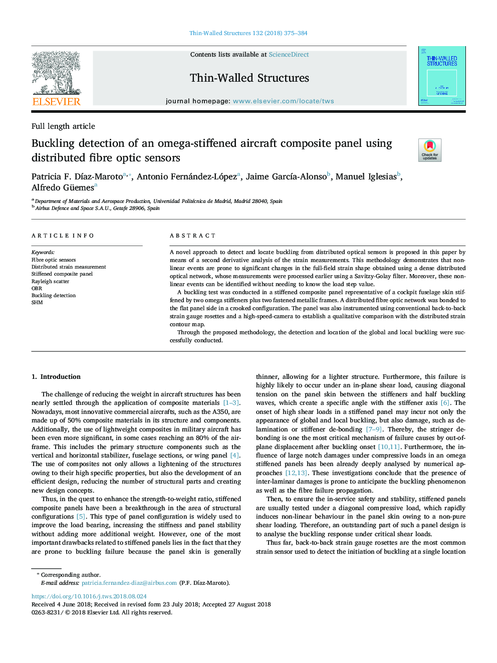 Buckling detection of an omega-stiffened aircraft composite panel using distributed fibre optic sensors