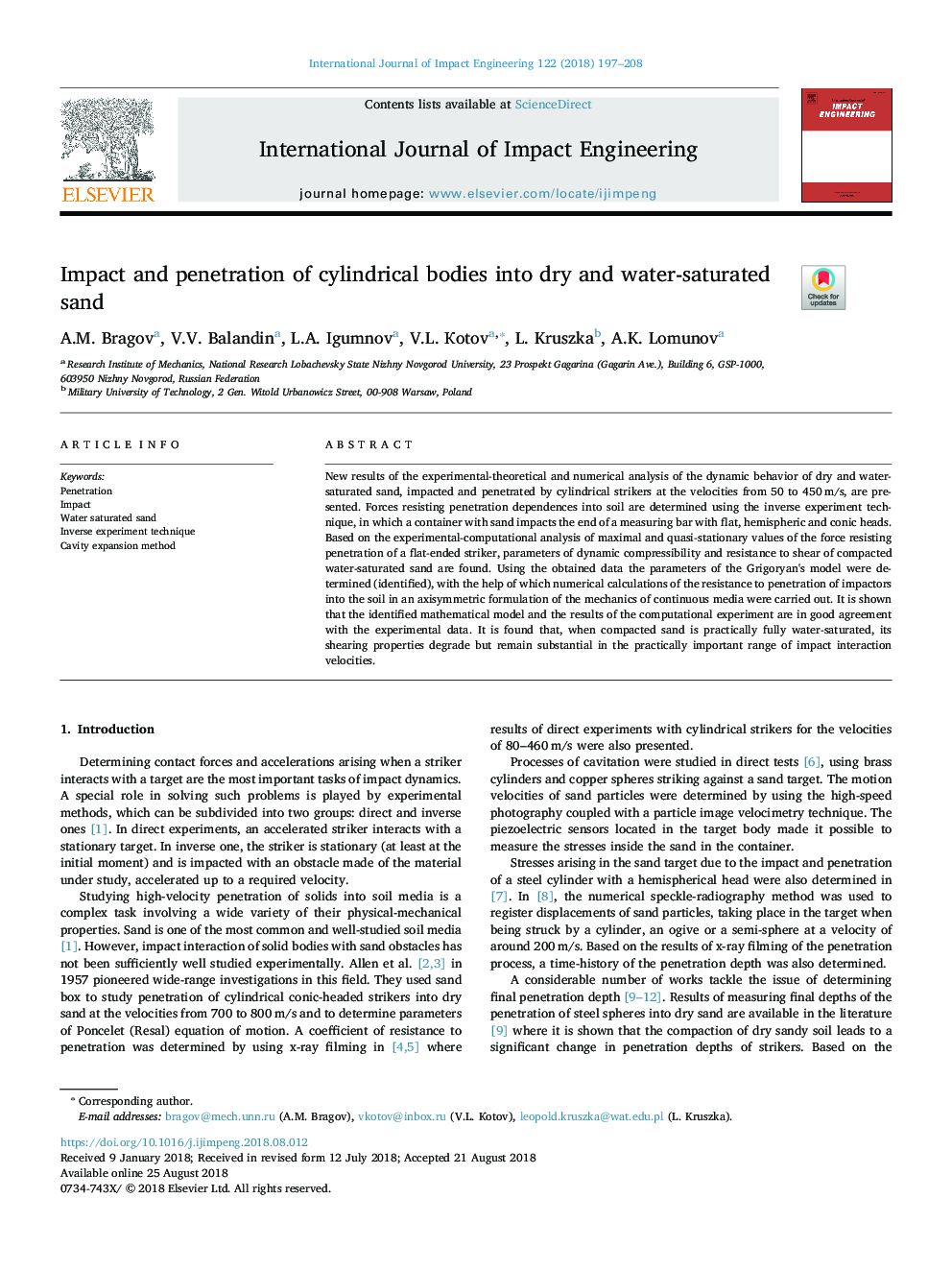 Impact and penetration of cylindrical bodies into dry and water-saturated sand