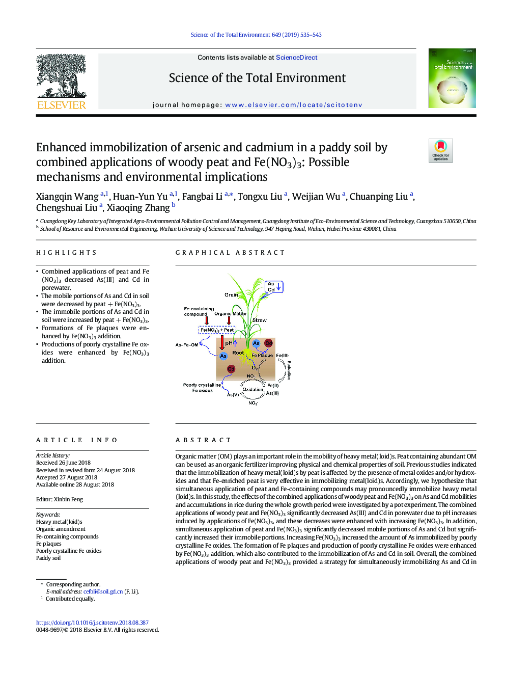 Enhanced immobilization of arsenic and cadmium in a paddy soil by combined applications of woody peat and Fe(NO3)3: Possible mechanisms and environmental implications