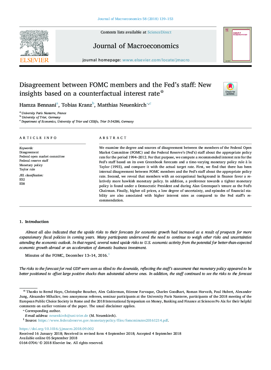 Disagreement between FOMC members and the Fed's staff: New insights based on a counterfactual interest rate