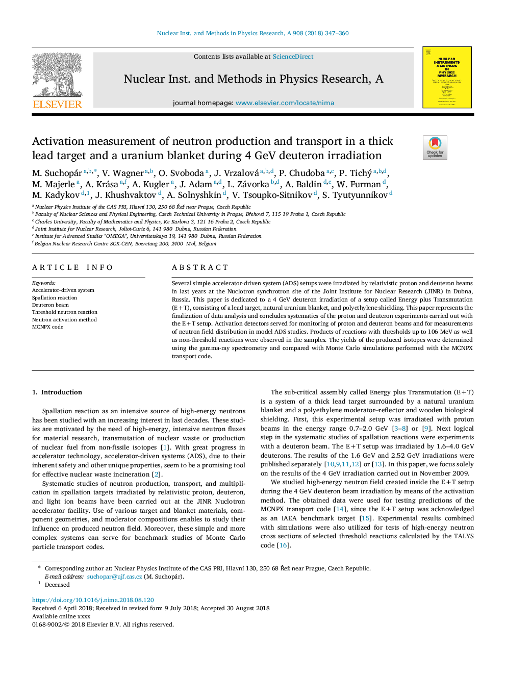 Activation measurement of neutron production and transport in a thick lead target and a uranium blanket during 4 GeV deuteron irradiation