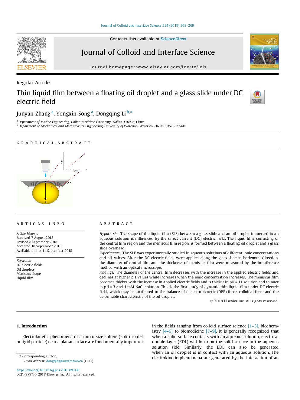 Thin liquid film between a floating oil droplet and a glass slide under DC electric field