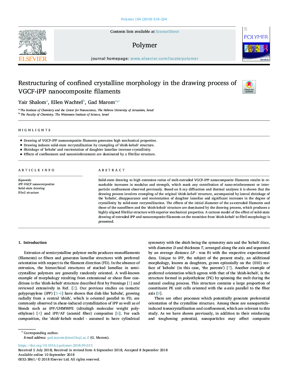 Restructuring of confined crystalline morphology in the drawing process of VGCF-iPP nanocomposite filaments