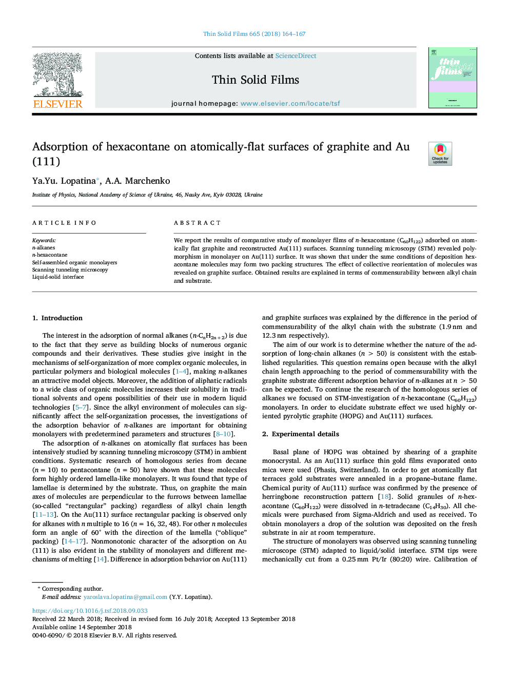 Adsorption of hexacontane on atomically-flat surfaces of graphite and Au(111)