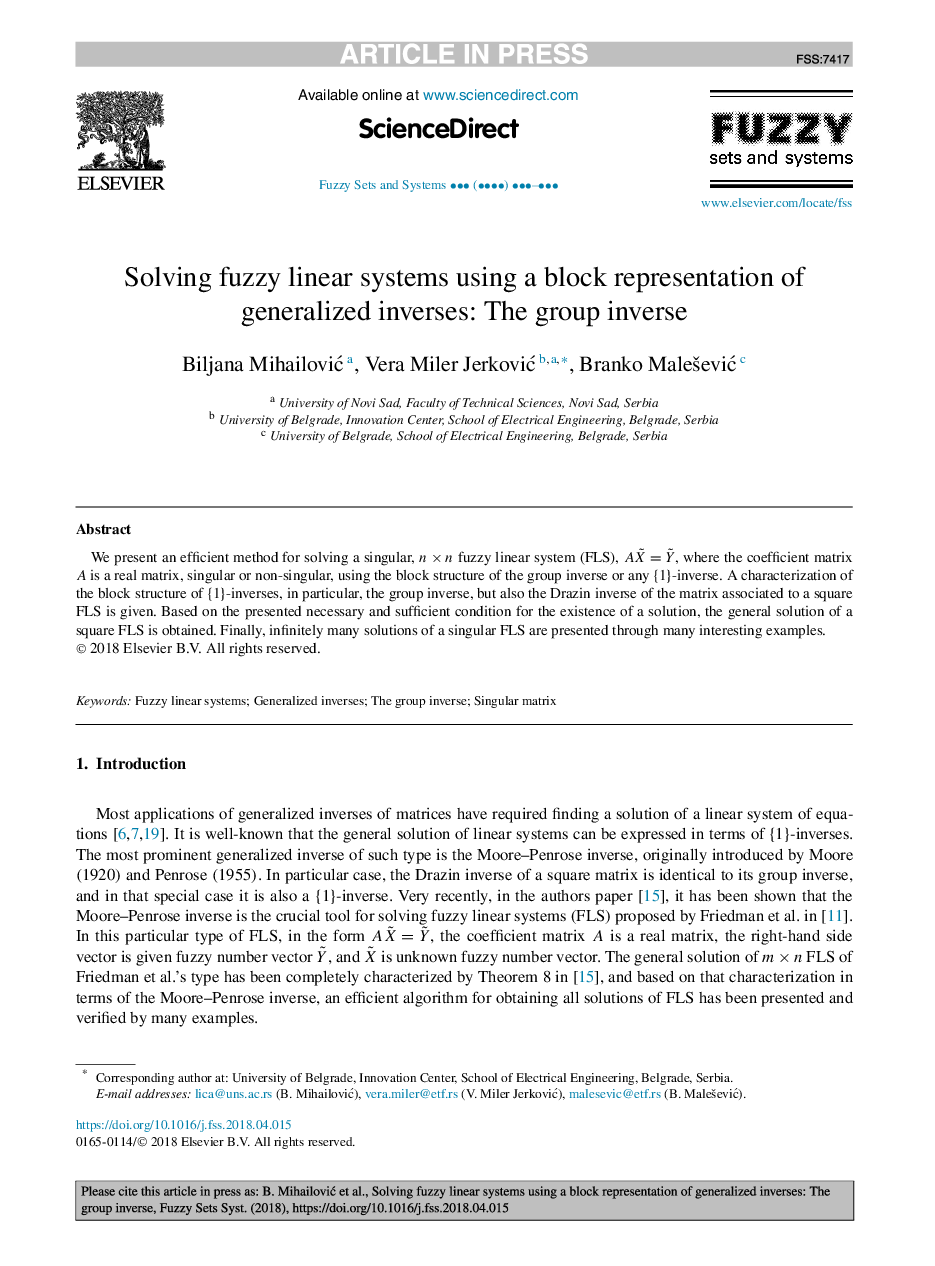 Solving fuzzy linear systems using a block representation of generalized inverses: The group inverse