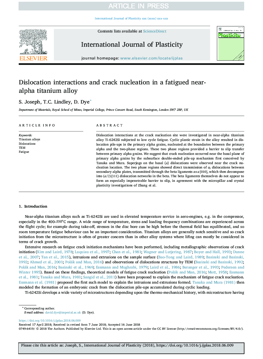 Dislocation interactions and crack nucleation in a fatigued near-alpha titanium alloy