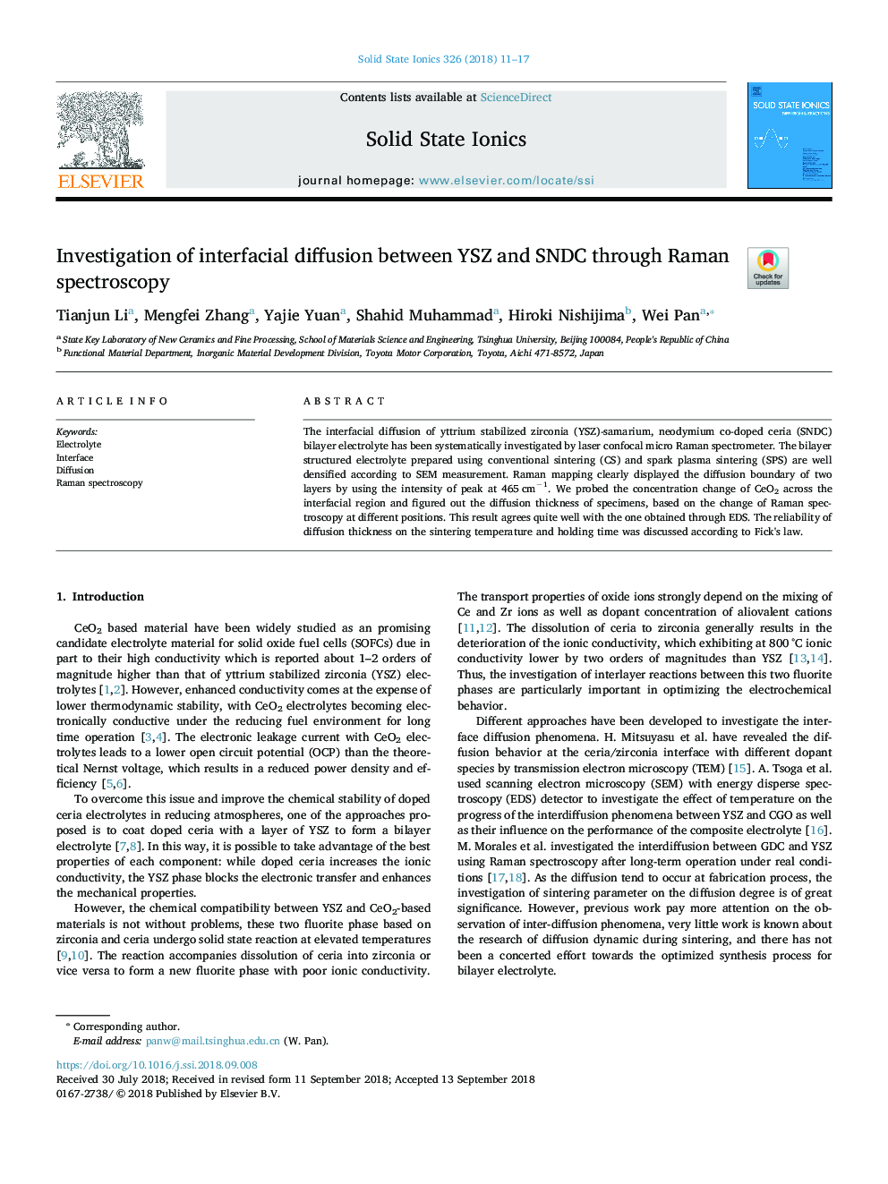 Investigation of interfacial diffusion between YSZ and SNDC through Raman spectroscopy