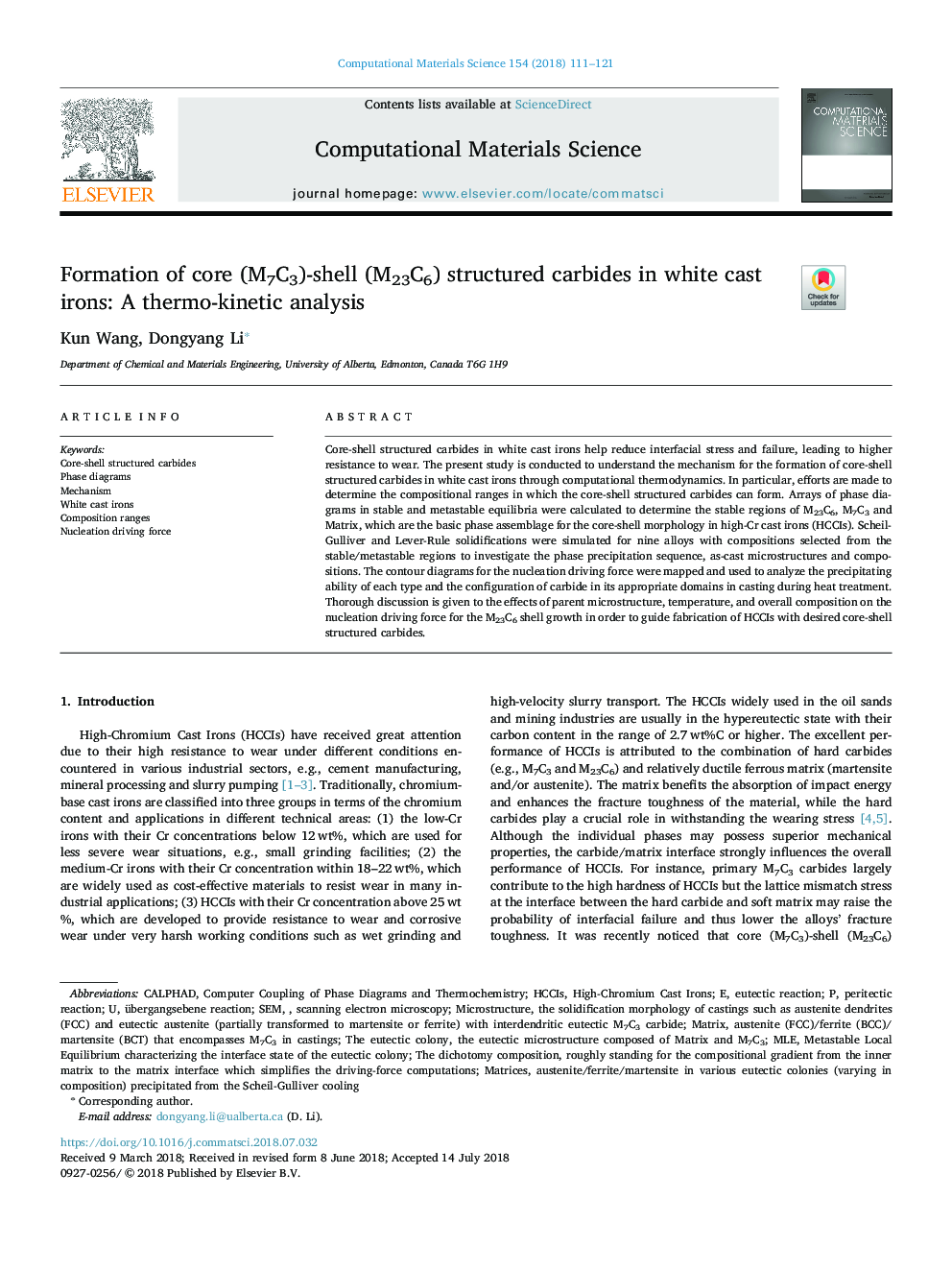 Formation of core (M7C3)-shell (M23C6) structured carbides in white cast irons: A thermo-kinetic analysis