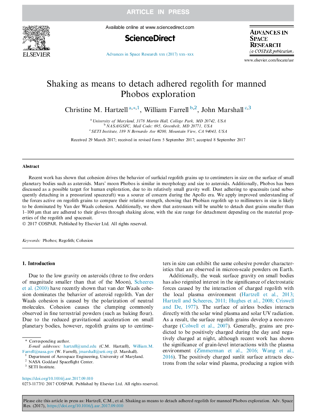 Shaking as means to detach adhered regolith for manned Phobos exploration