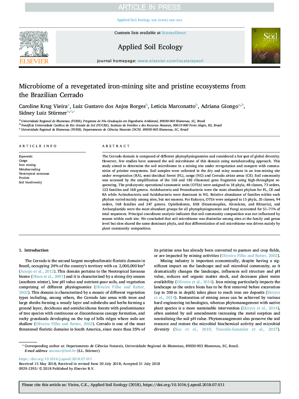 Microbiome of a revegetated iron-mining site and pristine ecosystems from the Brazilian Cerrado