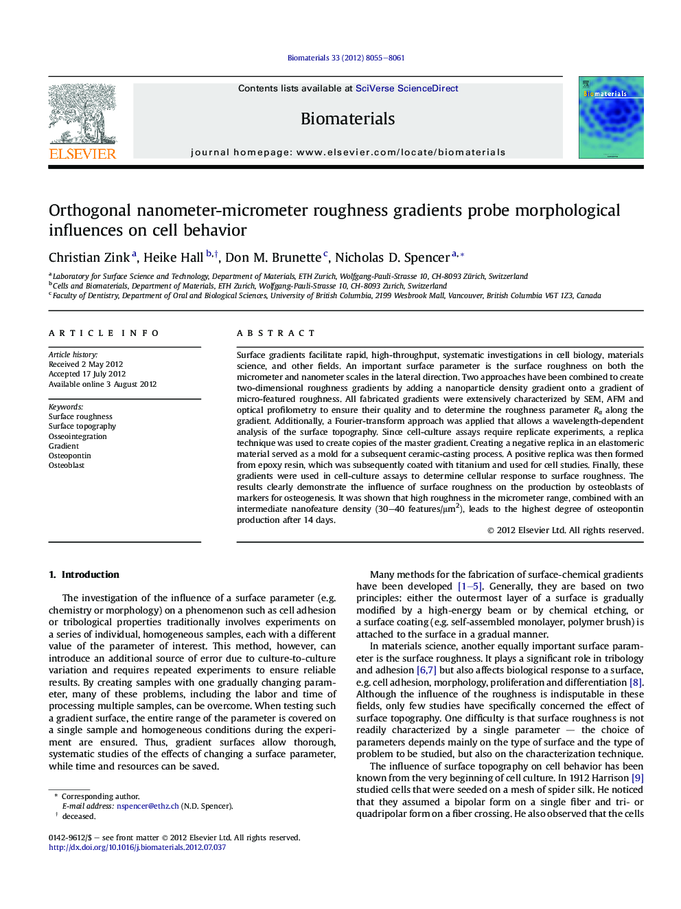 Orthogonal nanometer-micrometer roughness gradients probe morphological influences on cell behavior